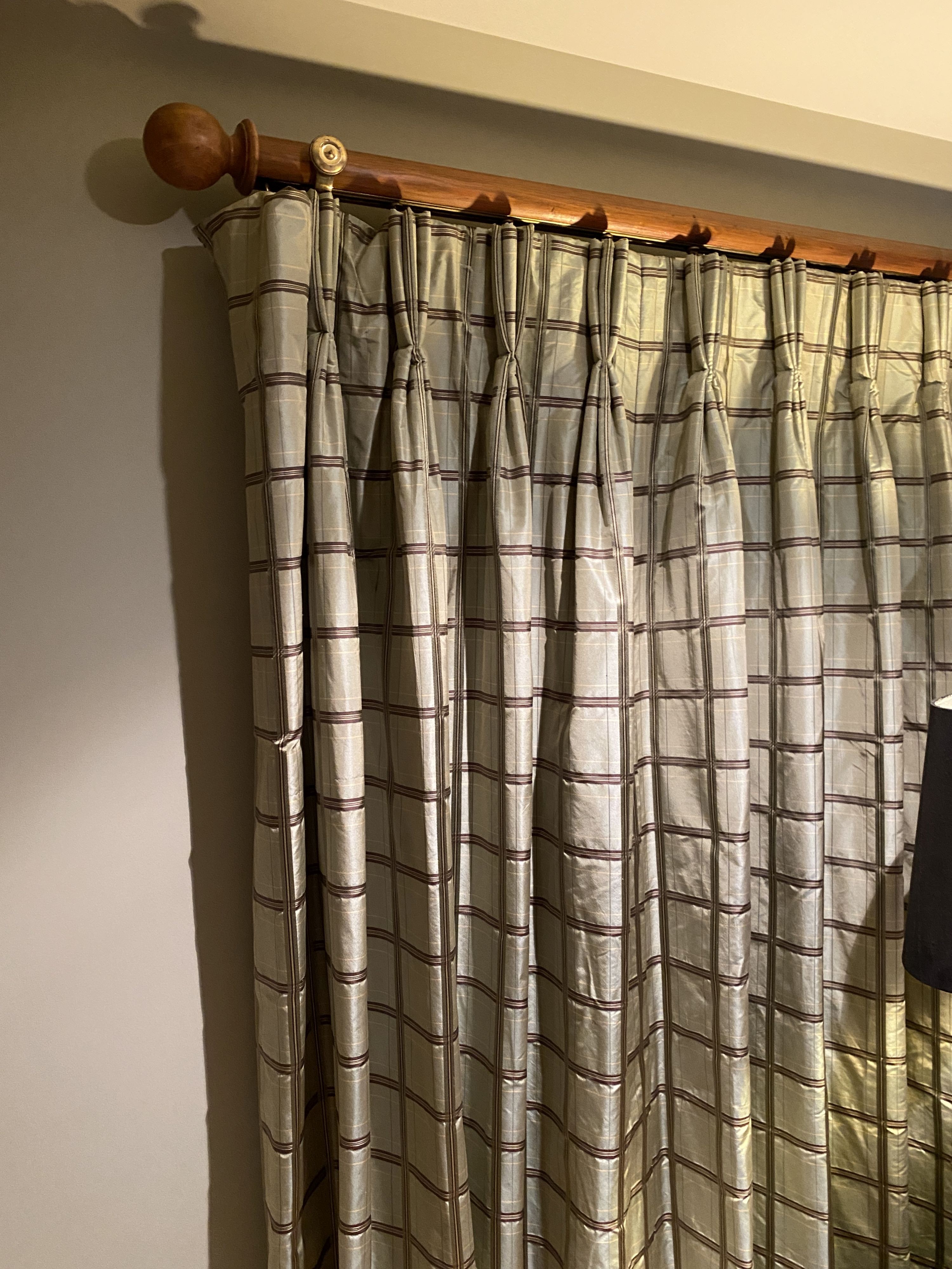 A pair of eau de nil silk curtains with check pattern, drop 207cm, made to fit an aperture of 3m